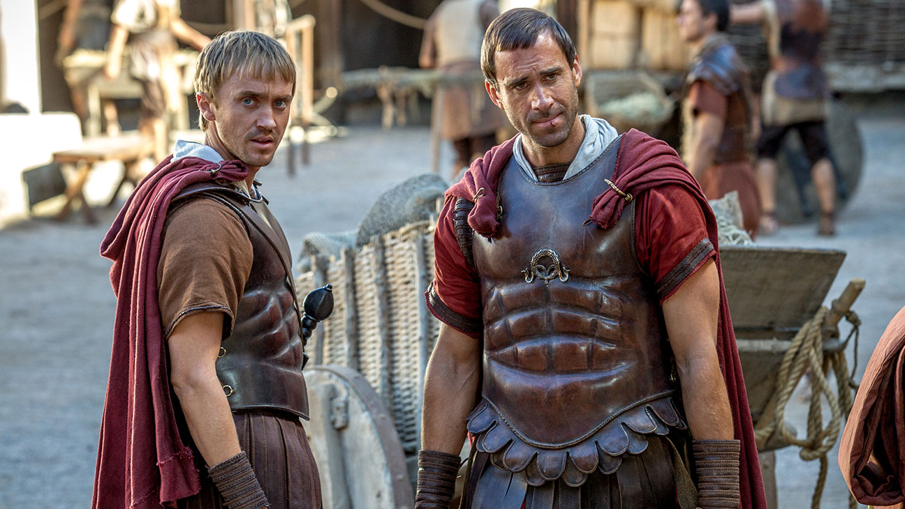 Clavius (Joseph Fiennes) and Lucius (Tom Felton) at the Roman barracks consider new information from the bystander about the apostles in Columbia Pictures' RISEN.